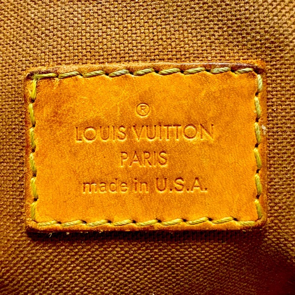 Pampered pre-owned Louis Vuitton Satchel.  Original lining can & a nicked strap.